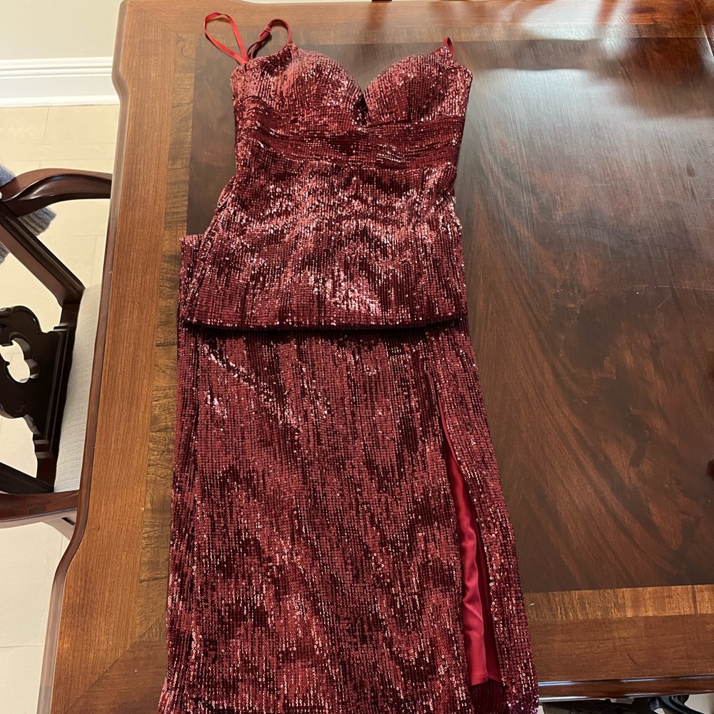 Red Cinderella Divine sequin dress.